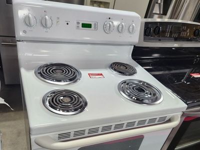BEAUTIFUL GE WHITE COIL TOP RANGE! WITH A FULL WARRANTY