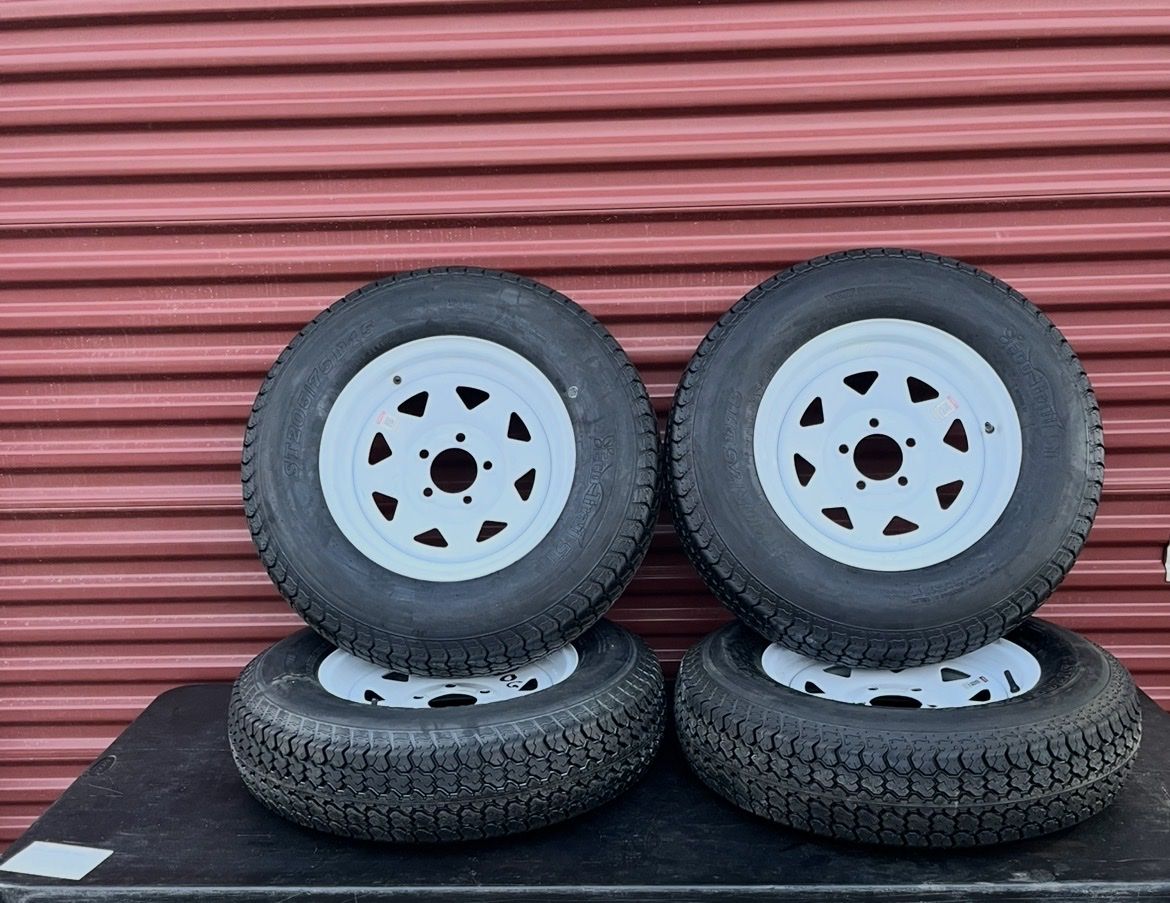 New Set of 4 Eco Trail ST 205/75 D 15 Trailer Tires Mounted on New White Spoke Wheels. 5 on 4.5 Pattern