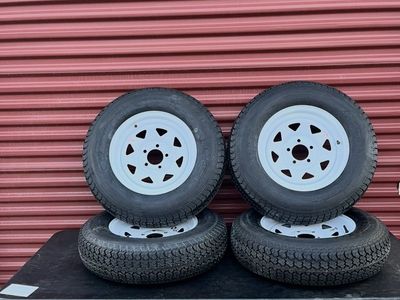 New Set of 4 Eco Trail ST 205/75 D 15 Trailer Tires Mounted on New White Spoke Wheels. 5 on 4.5 Pattern