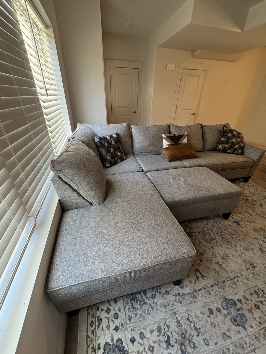 Grey Fabric L-Shaped Sectional Sofa with Ottoman and Chaise, 3-Cushion Design