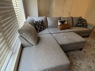 Grey Fabric L-Shaped Sectional Sofa with Ottoman and Chaise, 3-Cushion Design