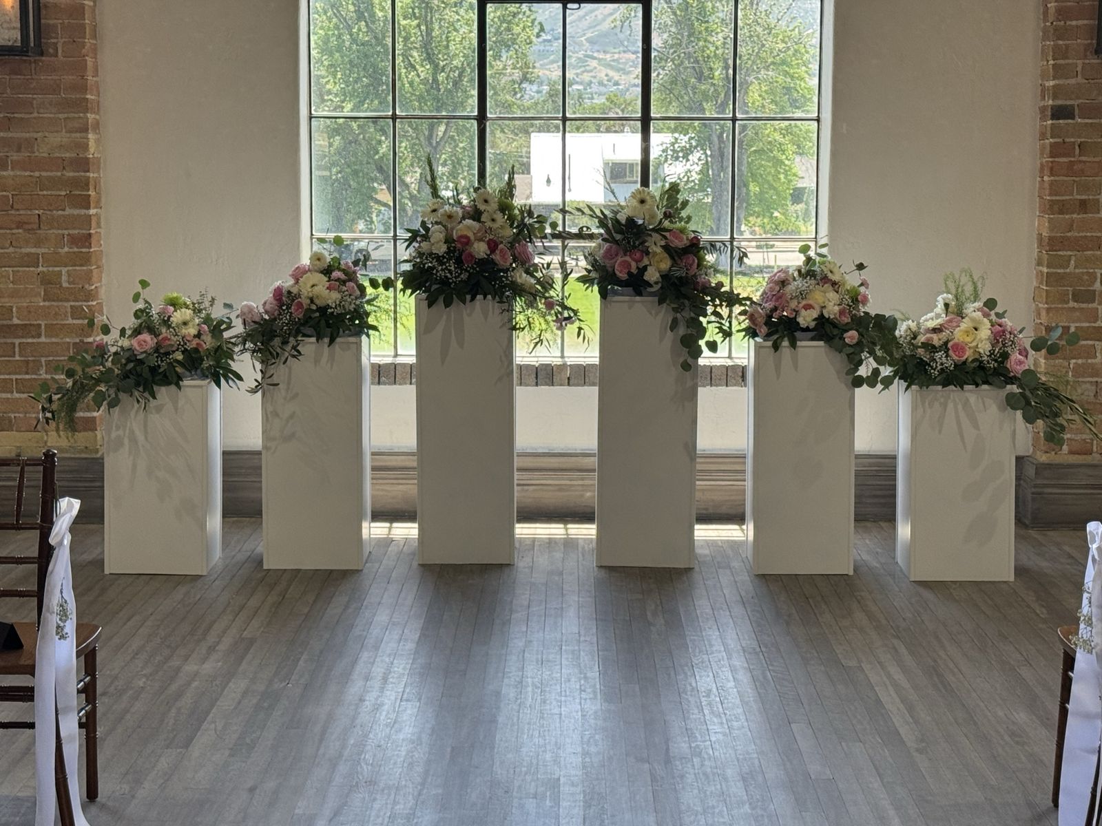 6 White Wedding Pillars for Rent-$125 per day.