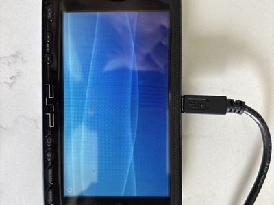 Sony PSP Bundle – Console, 16 Games & Movies, Chargers, Cases