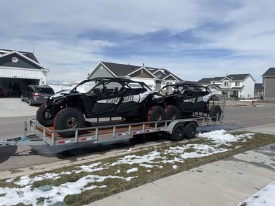 Pair of 2023 Can Am Maverick X3 RS Turbo RR w/ trailer.