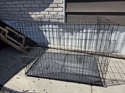 Extra large dog crate dog kennel, has two doors? 42 inches.