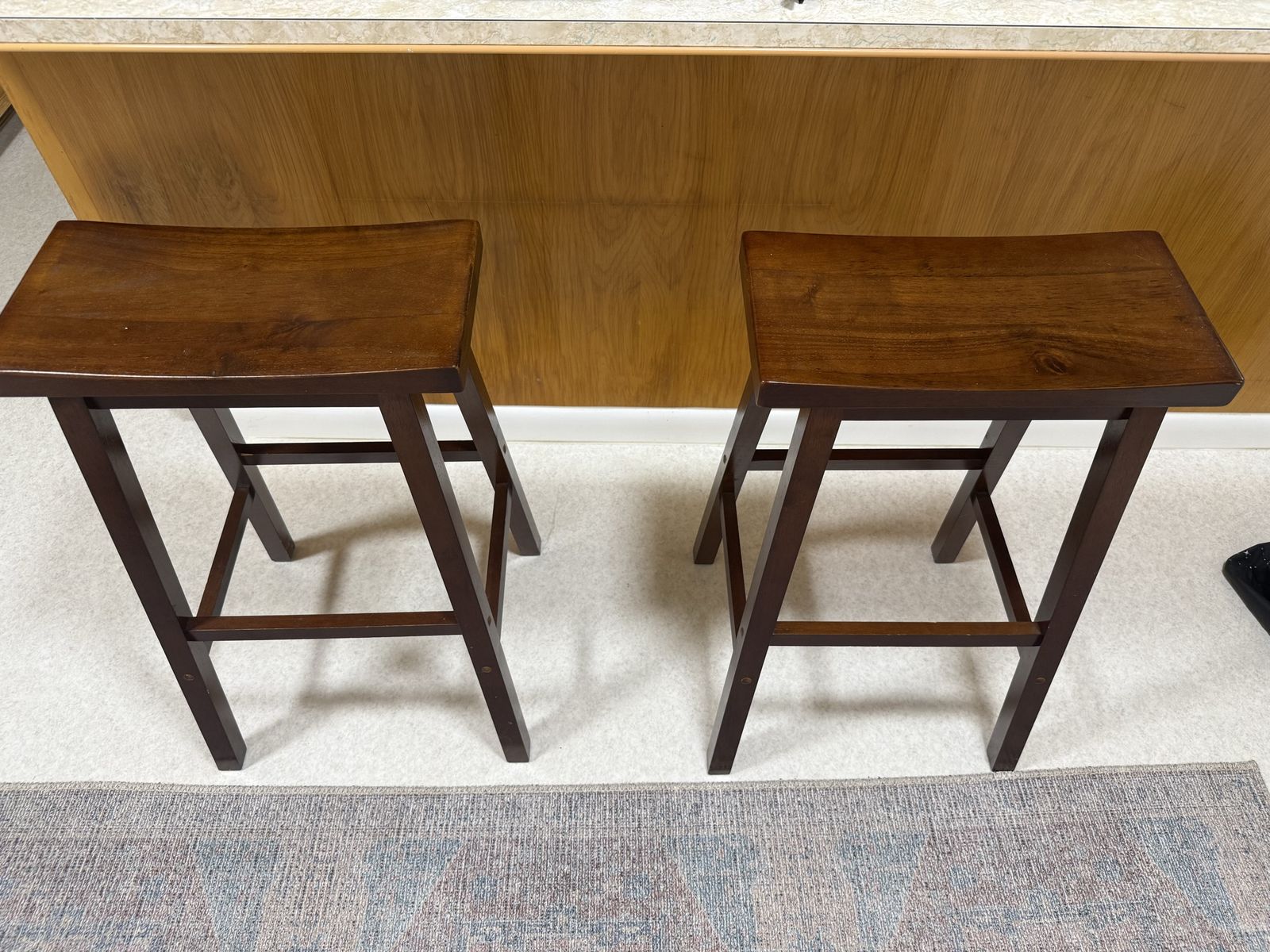 Pair of Wooden Bar Stools - Dark Wood Saddle Seat - Counter Height