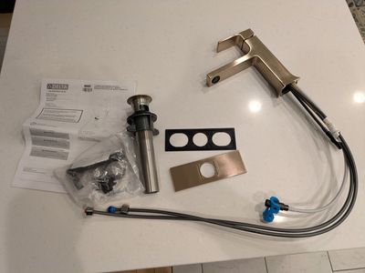 Delta bathroom faucet gold champagne NIB