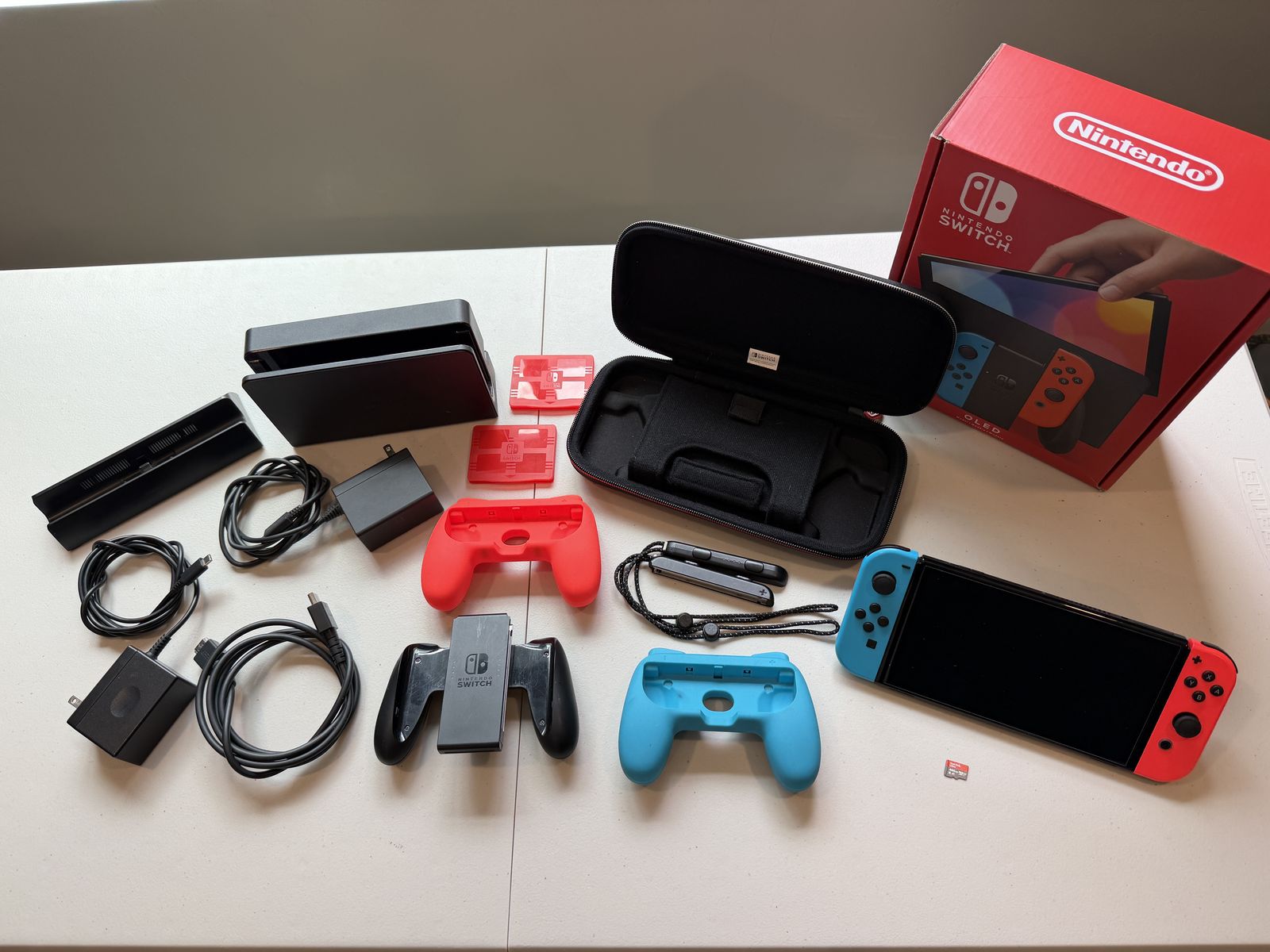 Nintendo Switch OLED  w/ Red/Blue Joy-Cons, 2 Docks, Controller holders, Case & 400GB MicroSD