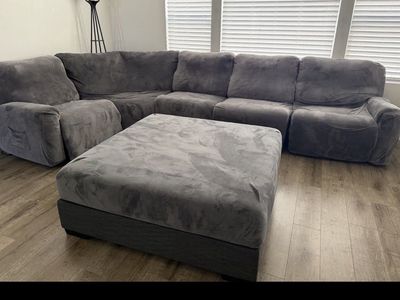 Five piece microfiber electric reclining sectional with couch covers and brand new ottoman