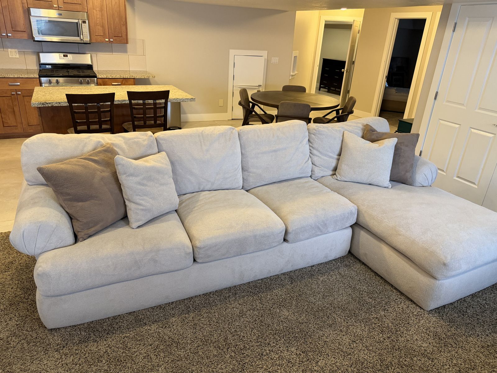 Used Fabric Sofa with Right-Side Lounge Section and Accent Pillows