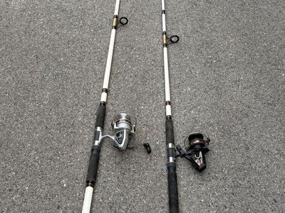 Two Shakespeare Alpha “Bigwater” boat/deep-sea rods — a 10’ (BWS 510-2M) and a 12’ (BWS 512-2M),m