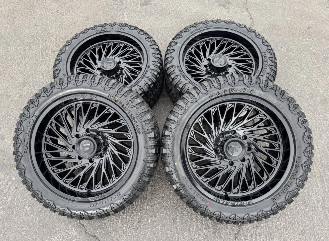 New 33x12.50r22 Patriot RT Fittipaldi FA15 Gloss Black 8x180 Chevy Silverado 2500 3500 Duramax 2011+ GMC wheels and tires 8 lug