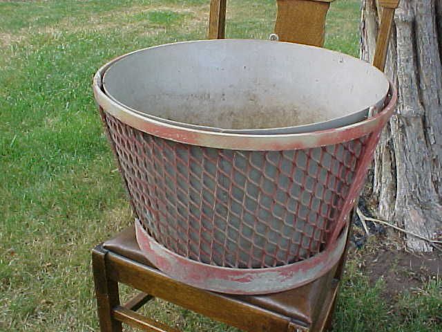 MCM heavy metal basket with liner...1950's era.  has hooks for hanging or reinvent  it