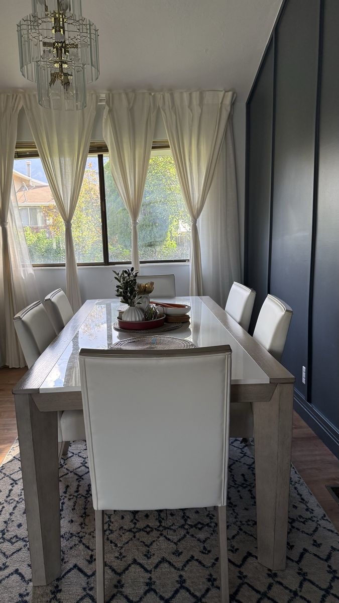 Modern Wooden Dining Table with White Upholstered Chairs
