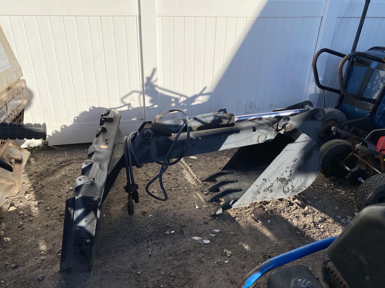 Mini ex skid steer attachment