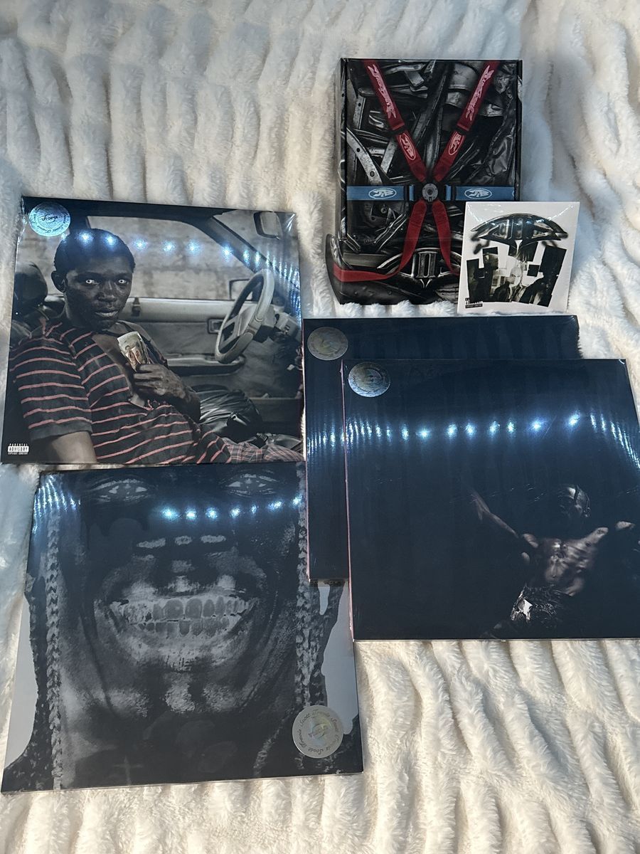 Travis Scott Utopia collectible vinyls and Jackboys CD