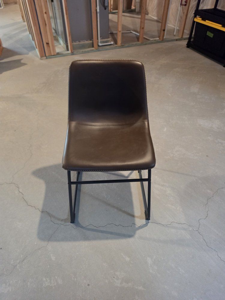 Living Spaces Cobbler Mocha Faux Leather Dining Chairs. Two chairs included.