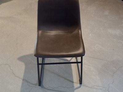 Living Spaces Cobbler Mocha Faux Leather Dining Chairs. Two chairs included.