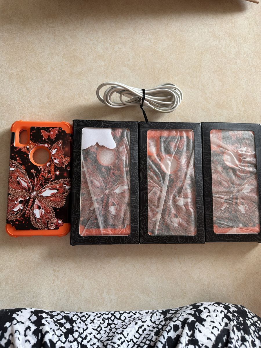 Orange Butterfly Phone Cases Lot with Charging Cable