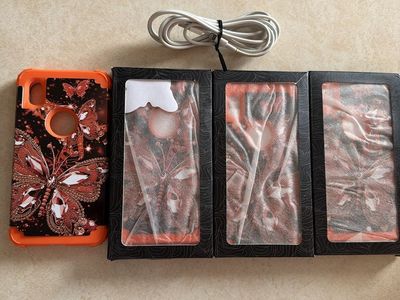 Orange Butterfly Phone Cases Lot with Charging Cable