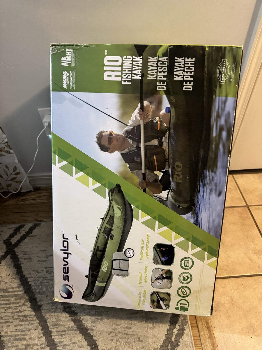 Sevylor inflatable fishing kayak and oars