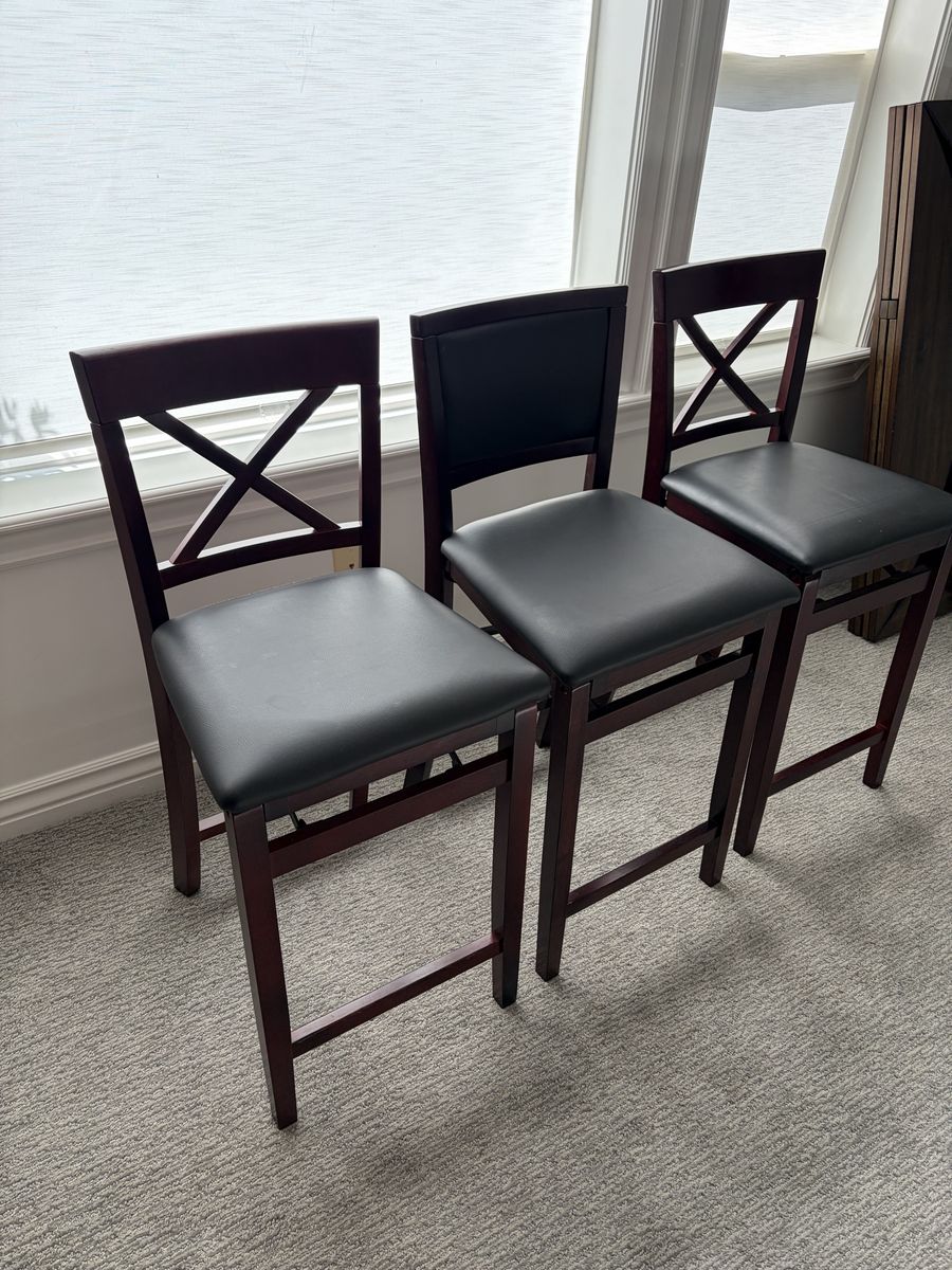 Three folding counter high stools $75 total