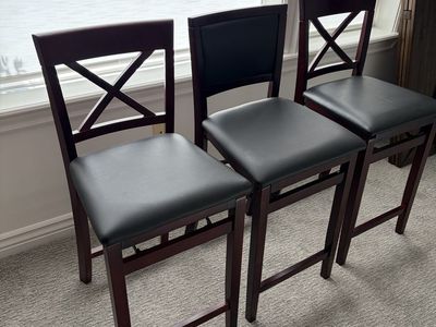 Three folding counter high stools $75 total