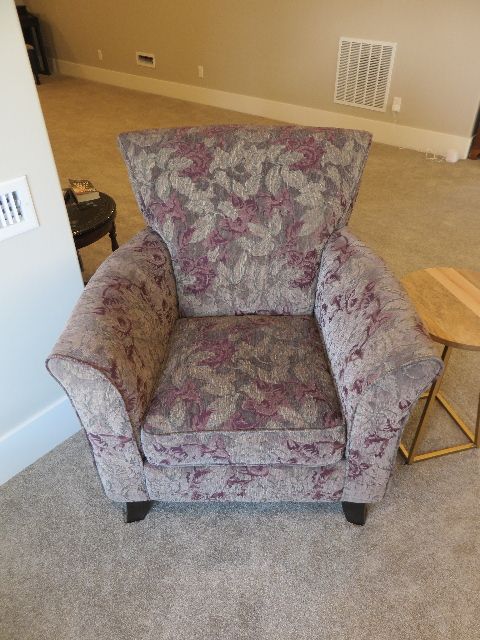 BARELY SAT IN BASSET CHAIR IN A MID-CENTURY UPHOLSTERY PATTERN 