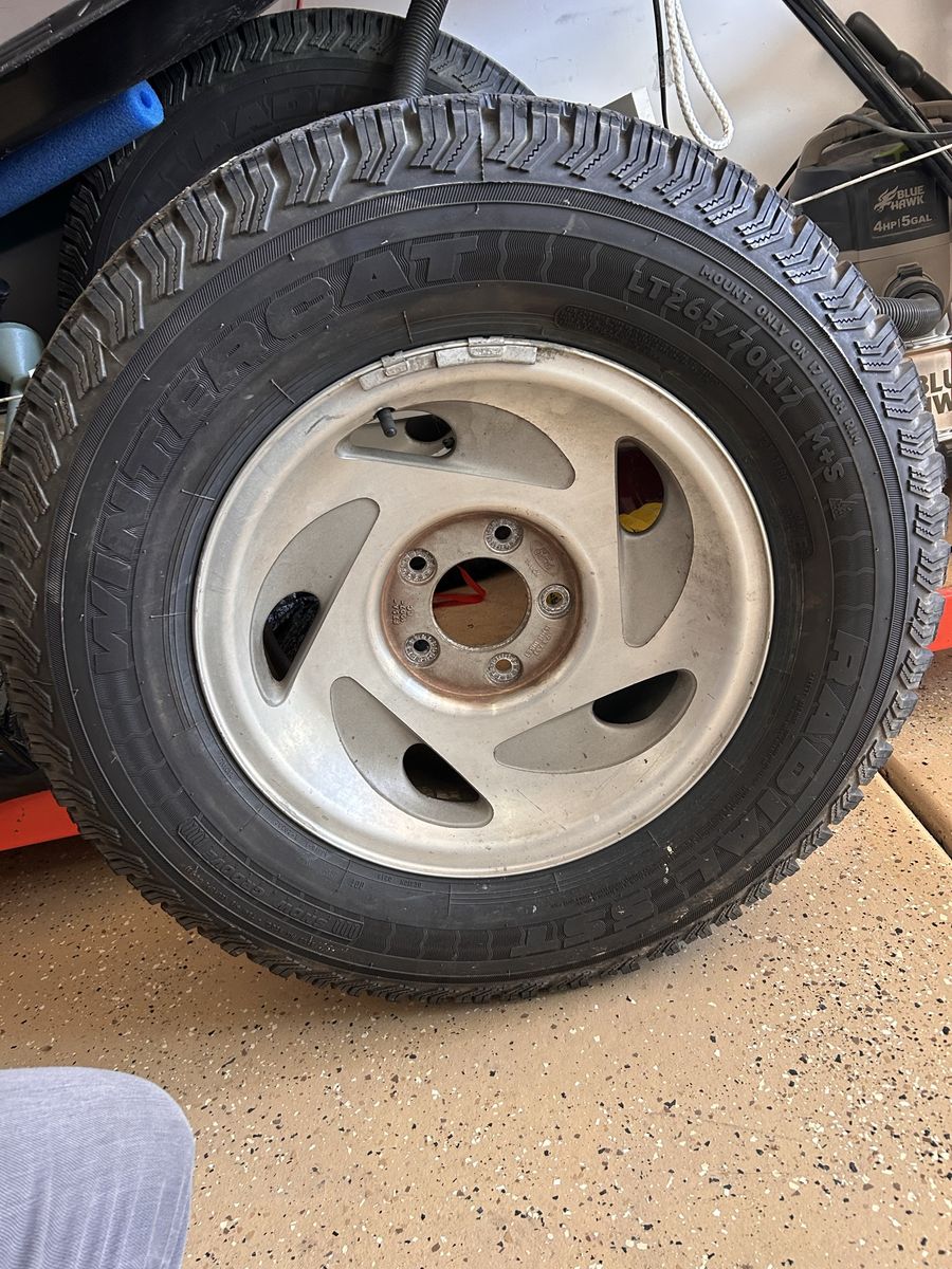 Ford expedition wheels and studded tires