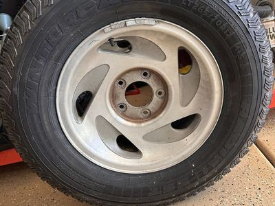 Ford expedition wheels and studded tires