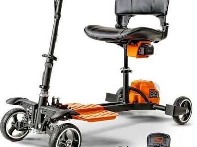 NEW IN BOX - 4 WHEEL FOLDABLE MOBILITY SCOOTER