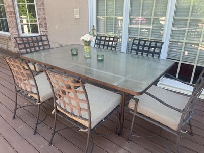 Glass top wrought iron table