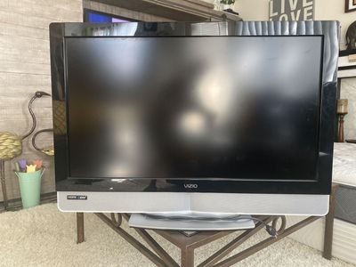 VIZIO TV 36x25 With Remote Control.$25