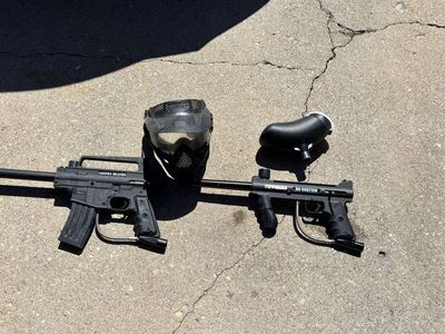 Two Tippman PaintBall Guns and 2 hoppers. 1 mask. Tipman 98 Custom and AlphaBlack