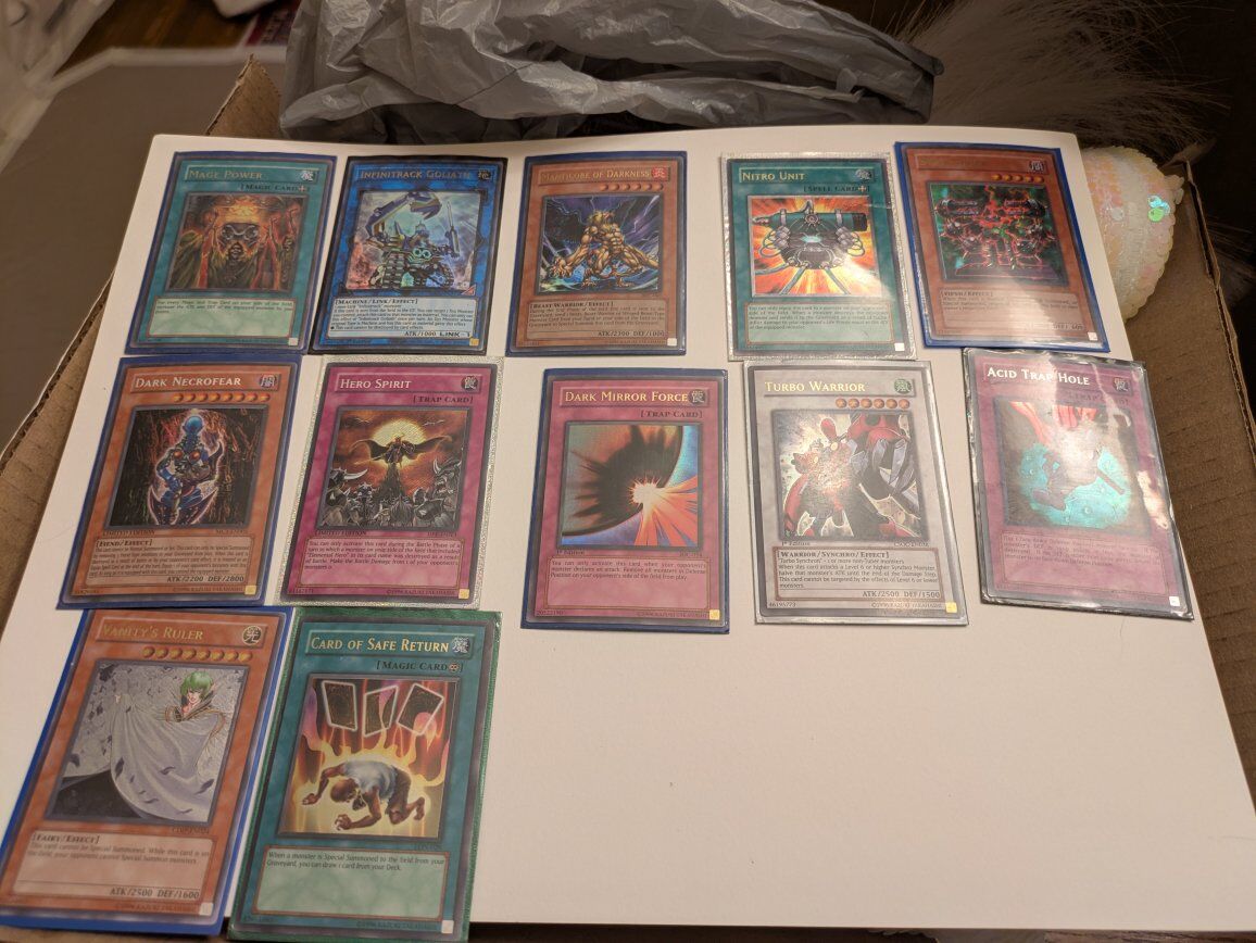 Various Holo Yu-Gi-Oh cards from the 2000s