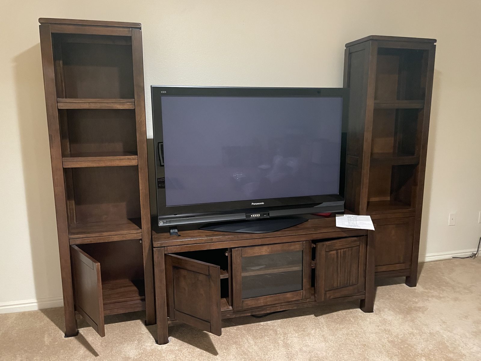 Three piece entertainment center with 56" plasma TV (old but entirely functional)