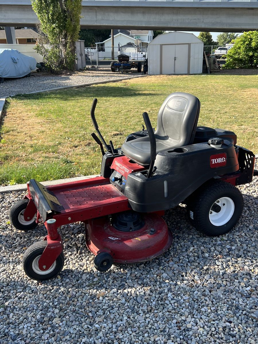 Toro time cutter SS 4225 and lawn sweeper.