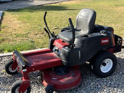 Toro time cutter SS 4225 and lawn sweeper.