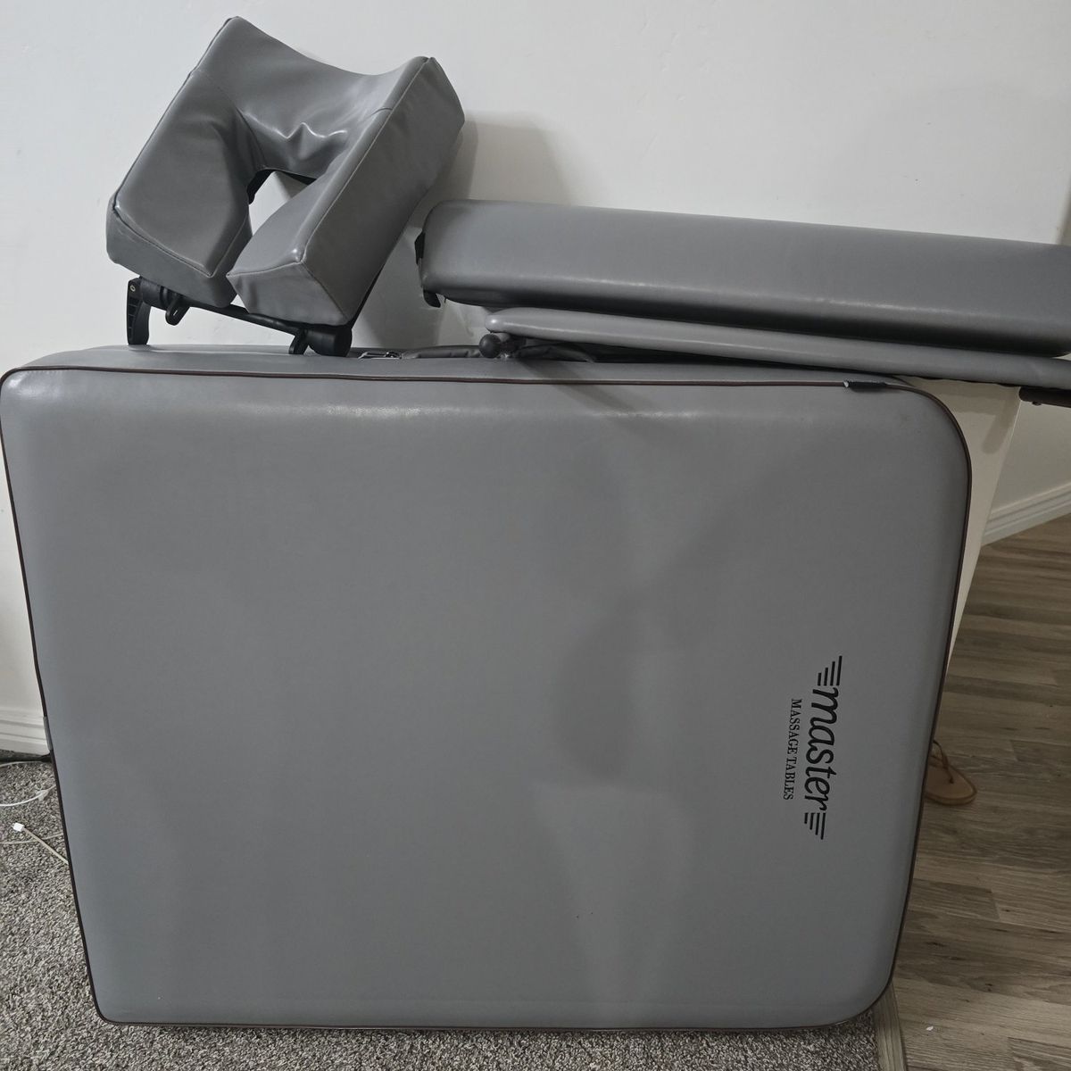 Massage table adjustable