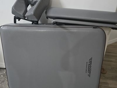 Massage table adjustable