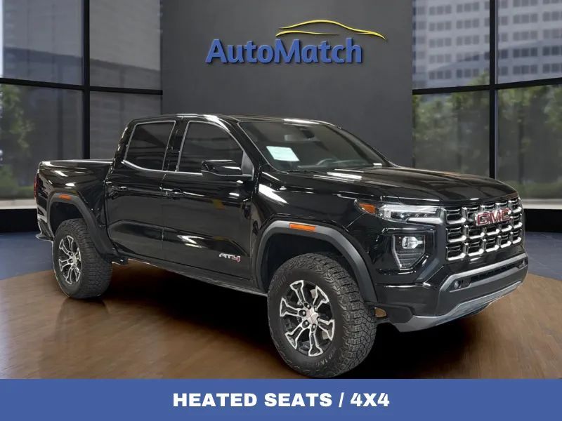 2024 GMC Canyon AT4 — rebuilt & branded title, 18% below market
