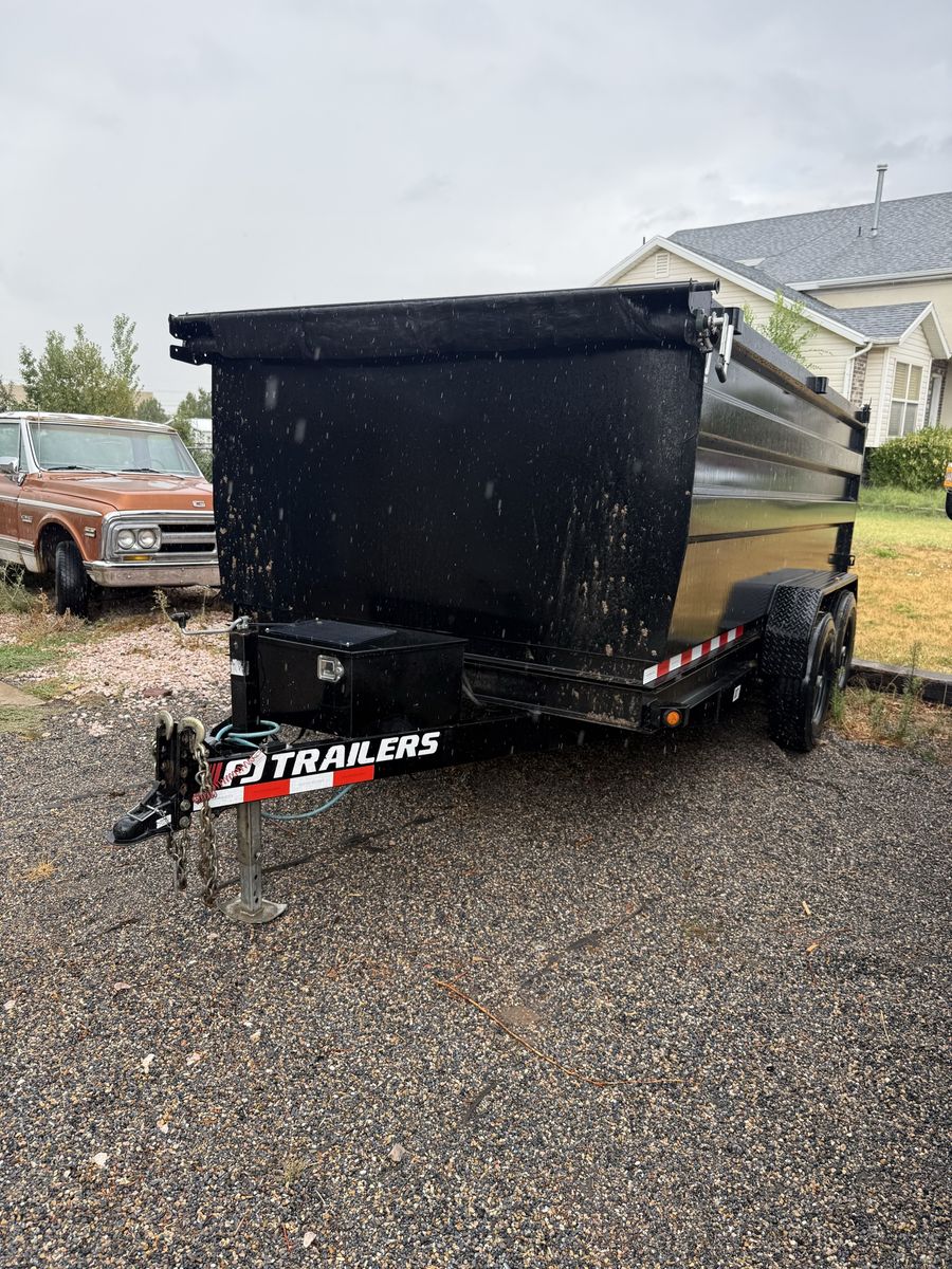 7x14 dump trailer for rent with 4ft walls