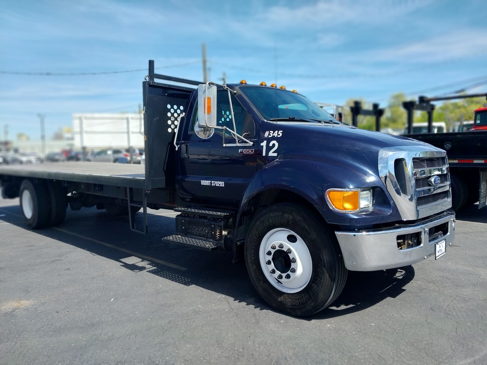 Clean. Ford 2015- F650 26,000 GVW Flat Bed---Low Miles- Diesel Automatic-