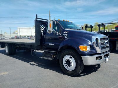 Clean. Ford 2015- F650 26,000 GVW Flat Bed---Low Miles- Diesel Automatic-