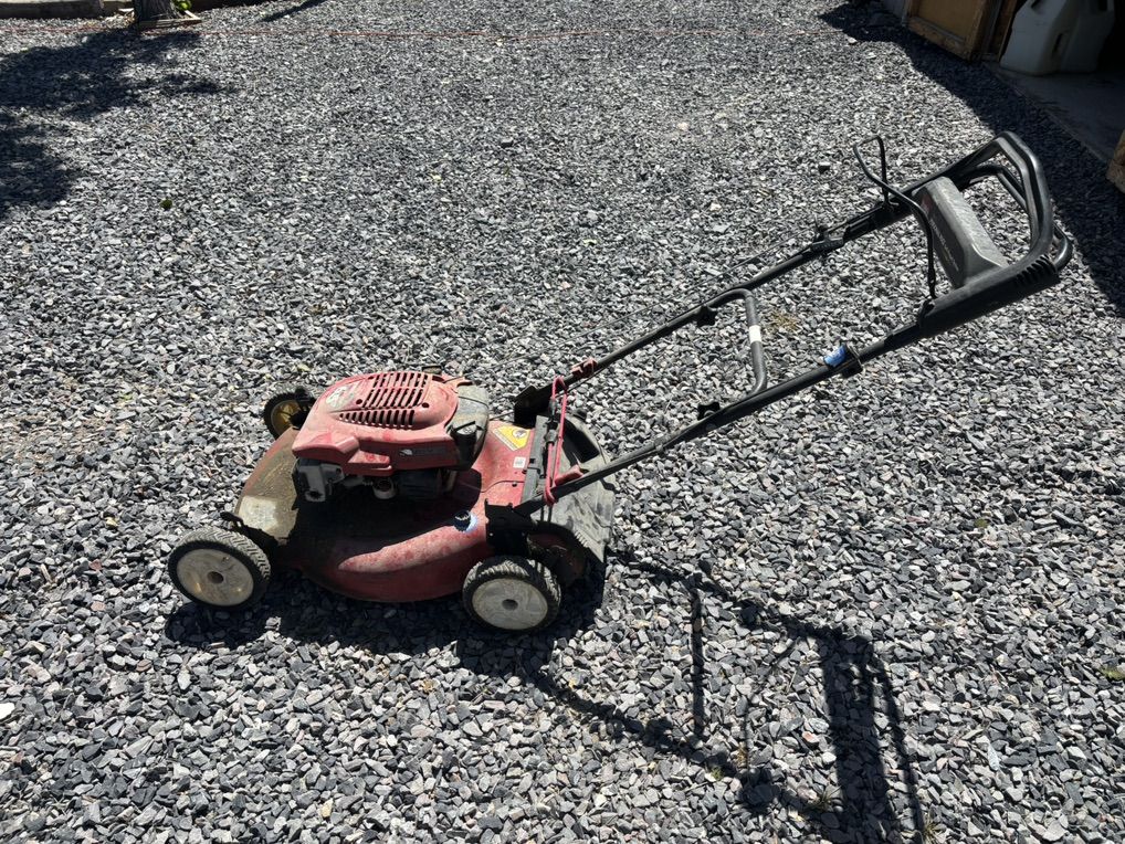 Toro Rear Drivr Mower.