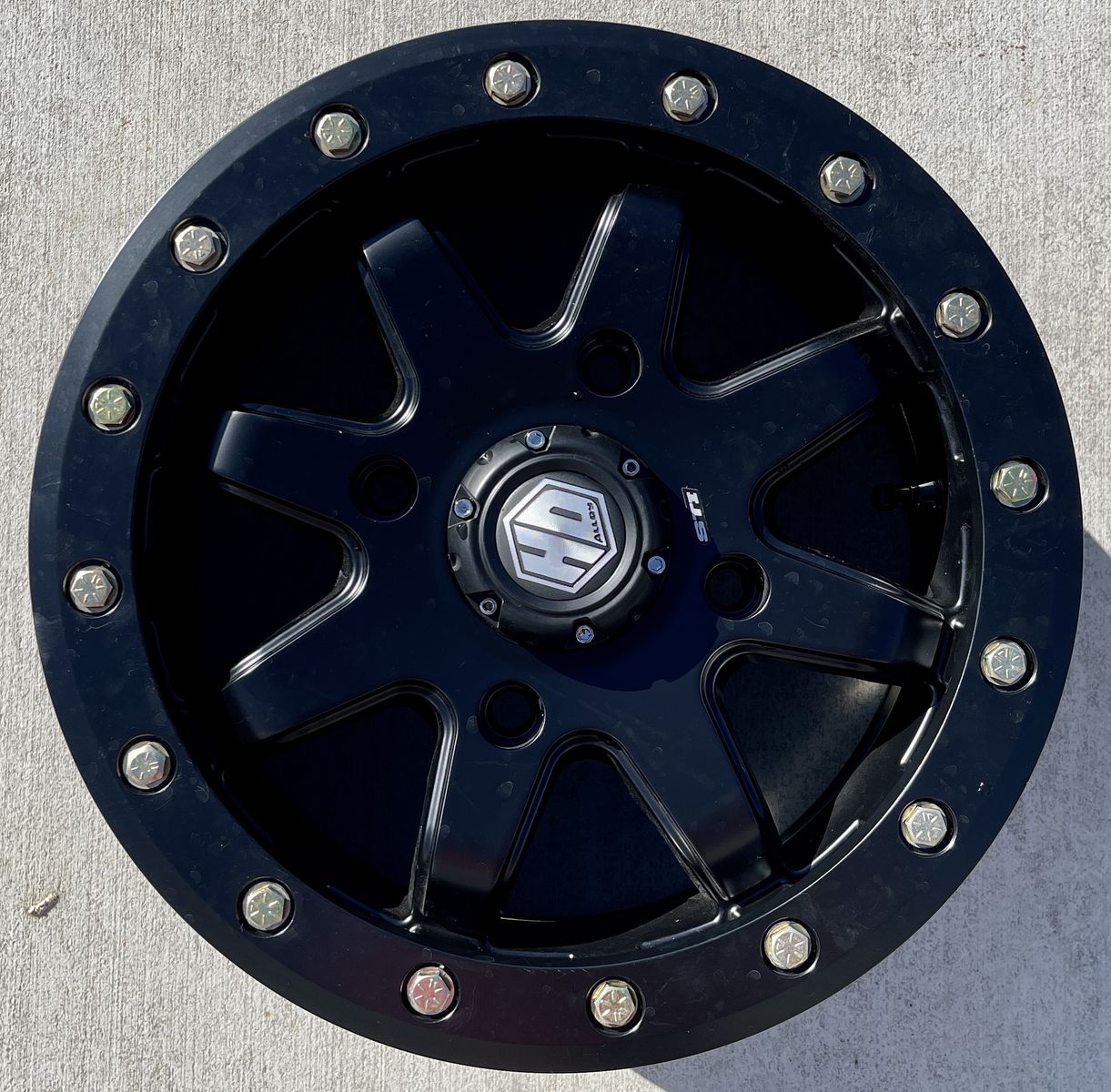 STI - 14HB928 - HD9 Beadlock Wheel, 14x7 - 4/137 Bolt Pattern - 6+1 Offset - Matte Black