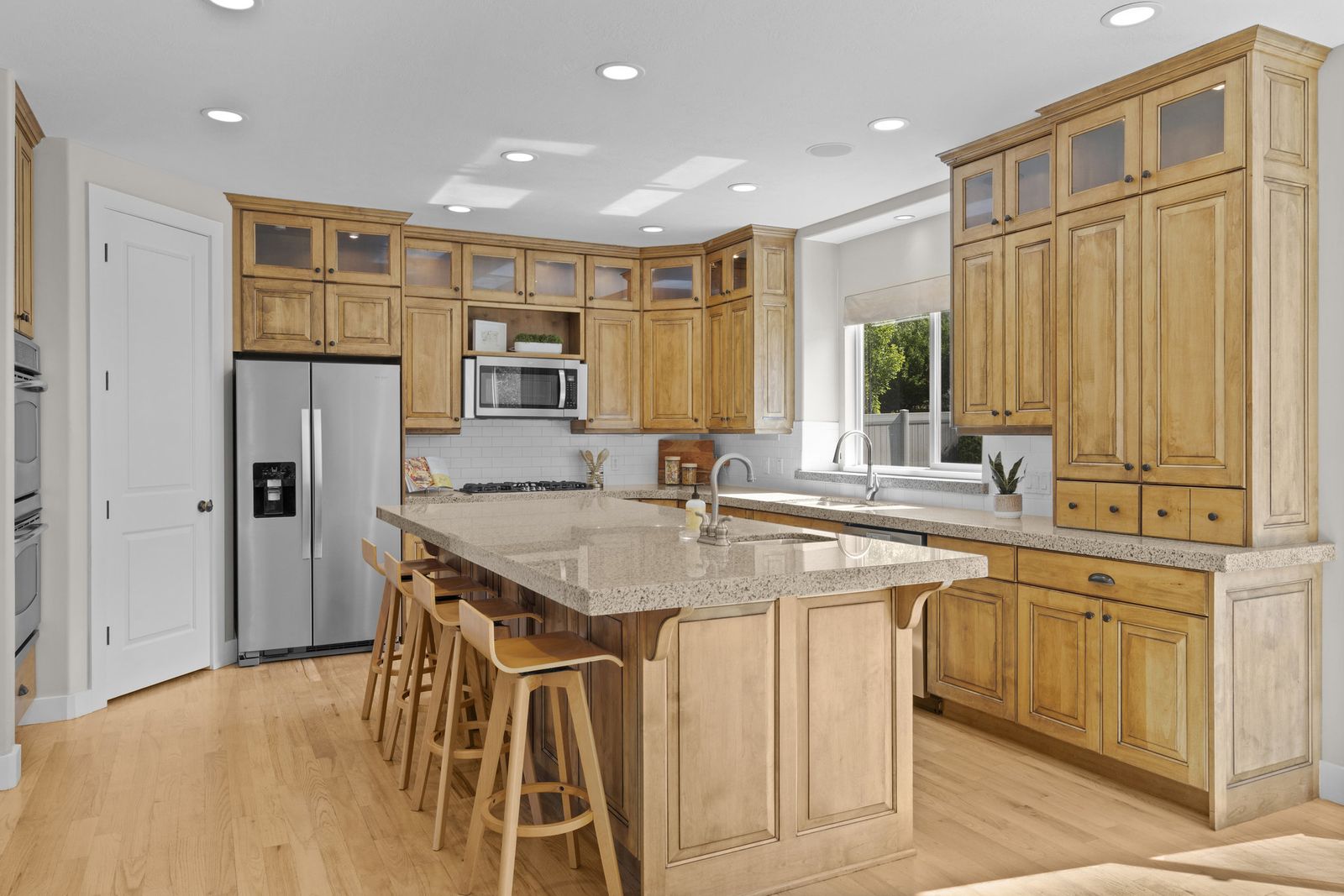 Kitchen cabinets, island, granite countertops, appliances