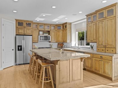 Kitchen cabinets, island, granite countertops, appliances