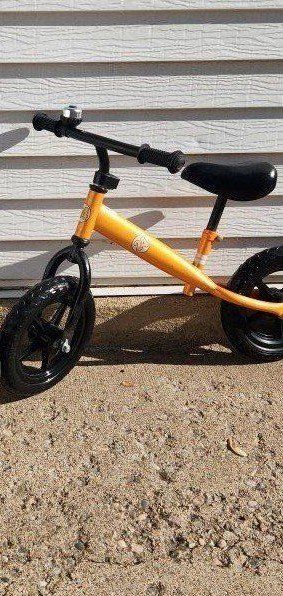 balance bike,  orange 24, 11" wheels, excel cond