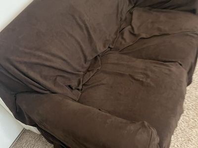 small couch with dark brown cover, covers in good shape couch looks like that black Fake leather not the greatest shape, perfect